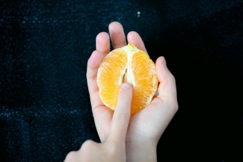 finger in orange 